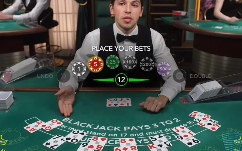 Jogue blackjack ao vivo na 166bet e vença o dealer na mesa de cartas.